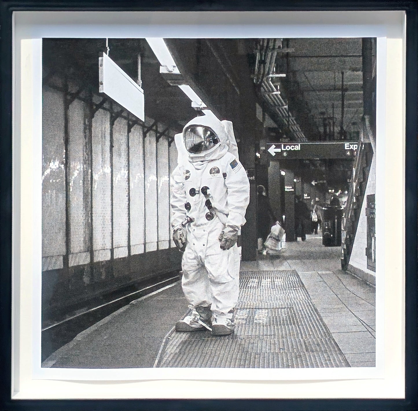 ANDY BLANK, "Space Underground" Contemporary Black and White Photograph of an Astronaut Riding a Bike